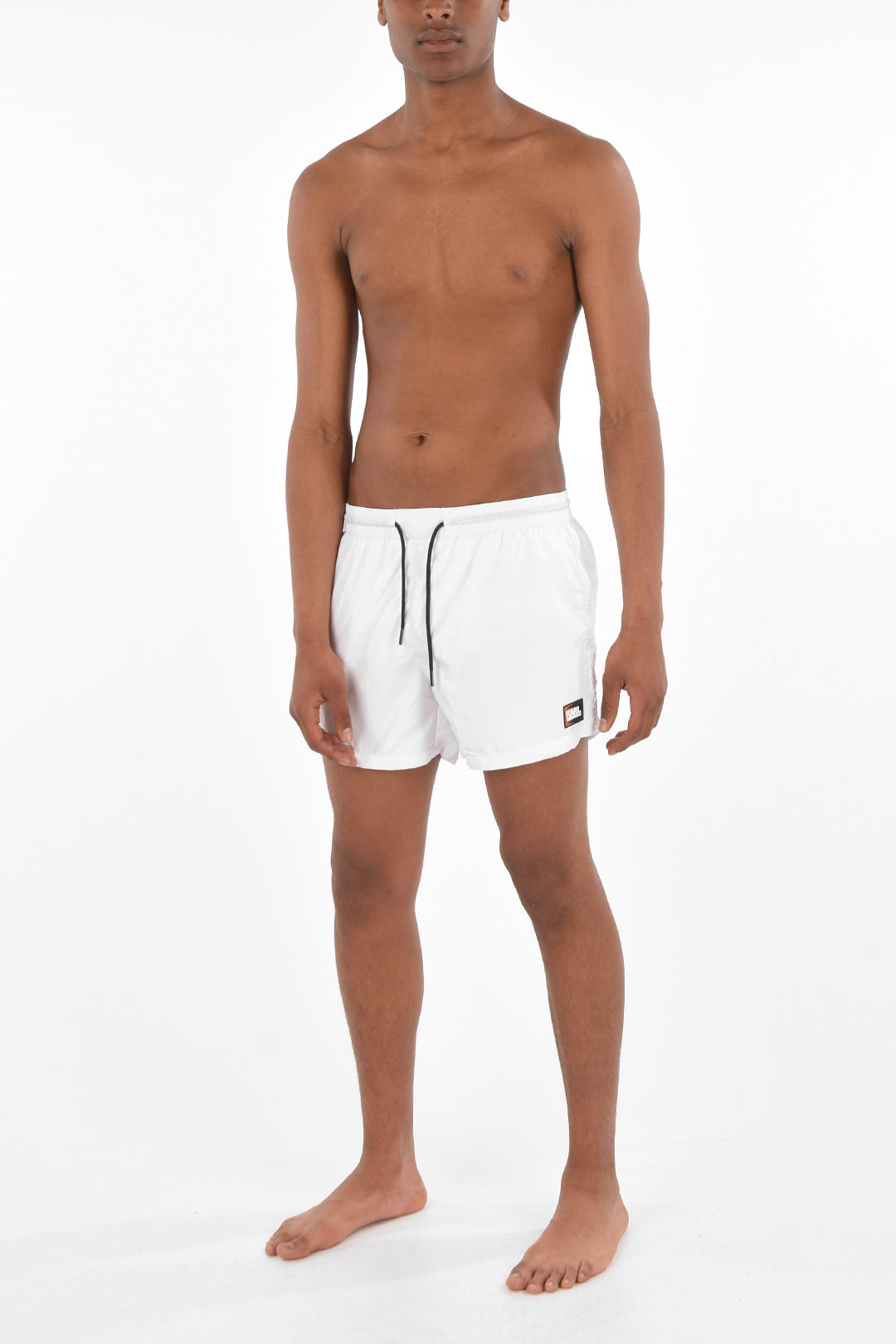 Solid-colored ethnic boxer swimsuit with white elastic waistband